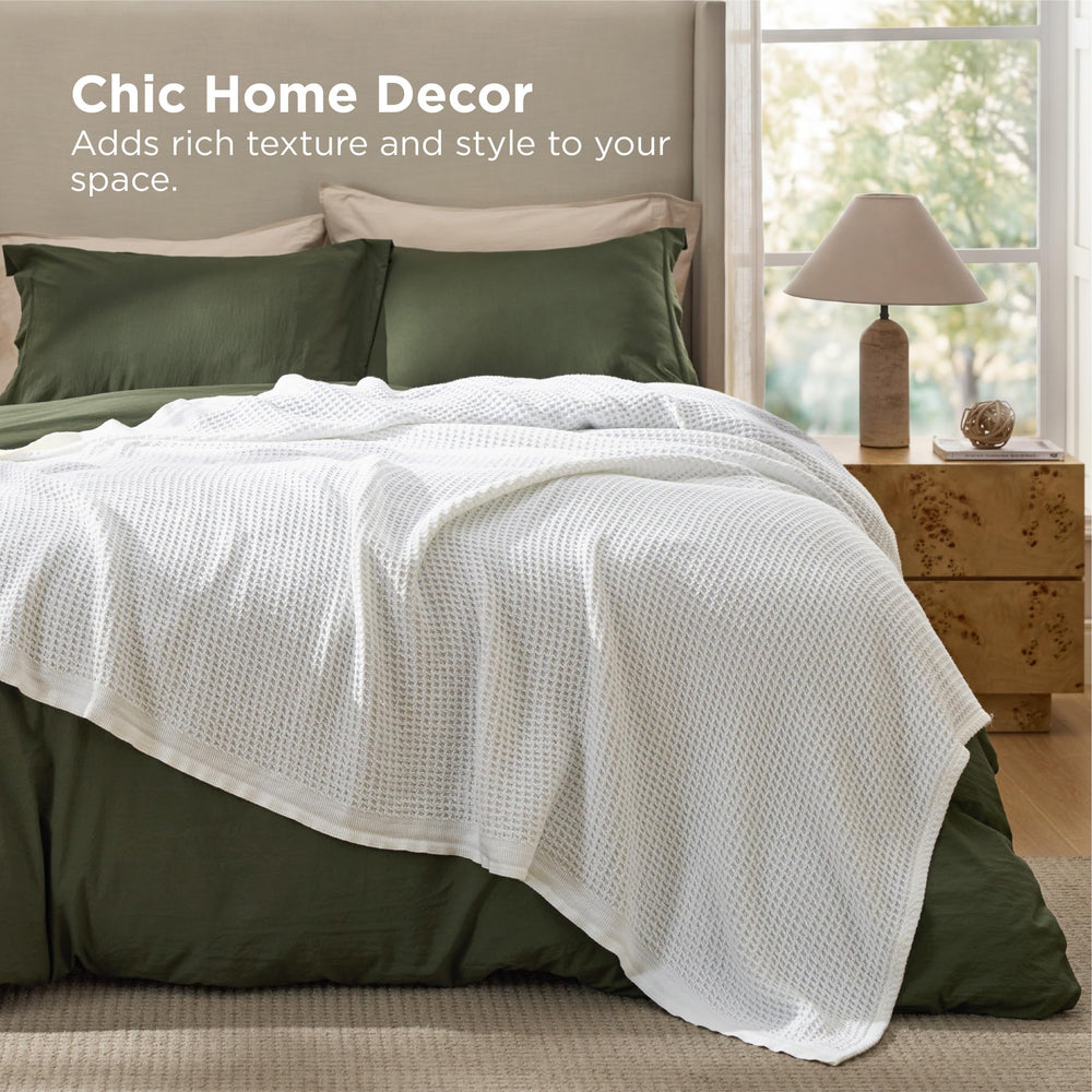 Bedsure draped over made bed in styled bedroom showing hotel-style aesthetic benefit
