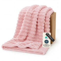 Bedsure throw front view showing coral-pink stripes and cozy appeal