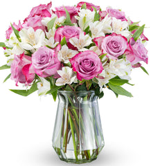 Benchmark Bouquets front view in glass vase showing colorful display and instant decor benefit