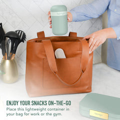 Bentgo close-up of removable toppings compartment showing secure fit