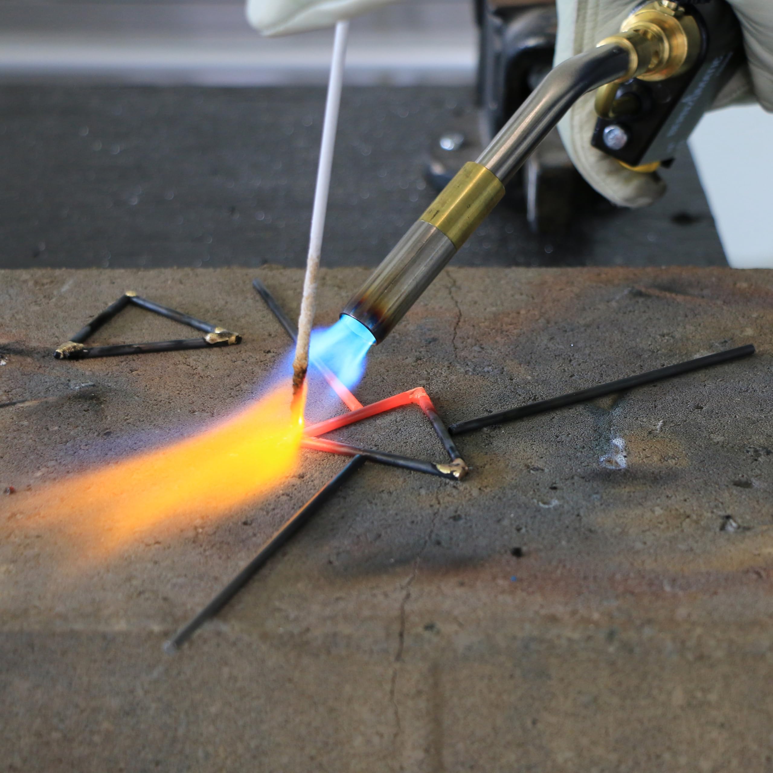 Bernzomatic TS8000 cast-aluminum body texture highlighting durability benefit: jobsite resilience