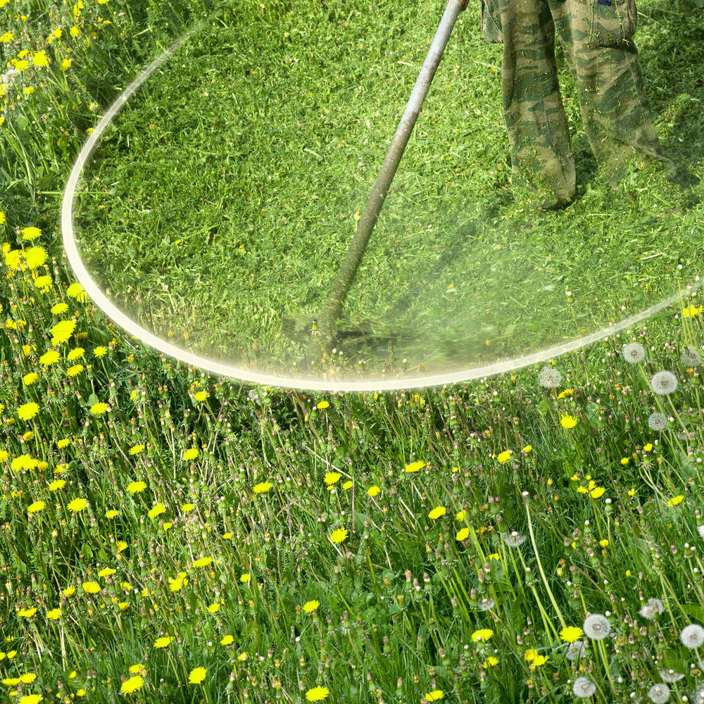 Bessport spools staged in yard next to trimmer, reduces downtime during mowing
