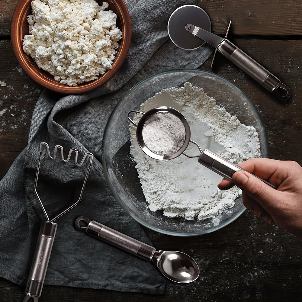 BESTZMWK accessories laid out showing included grater, measuring cups and cutters for versatility
