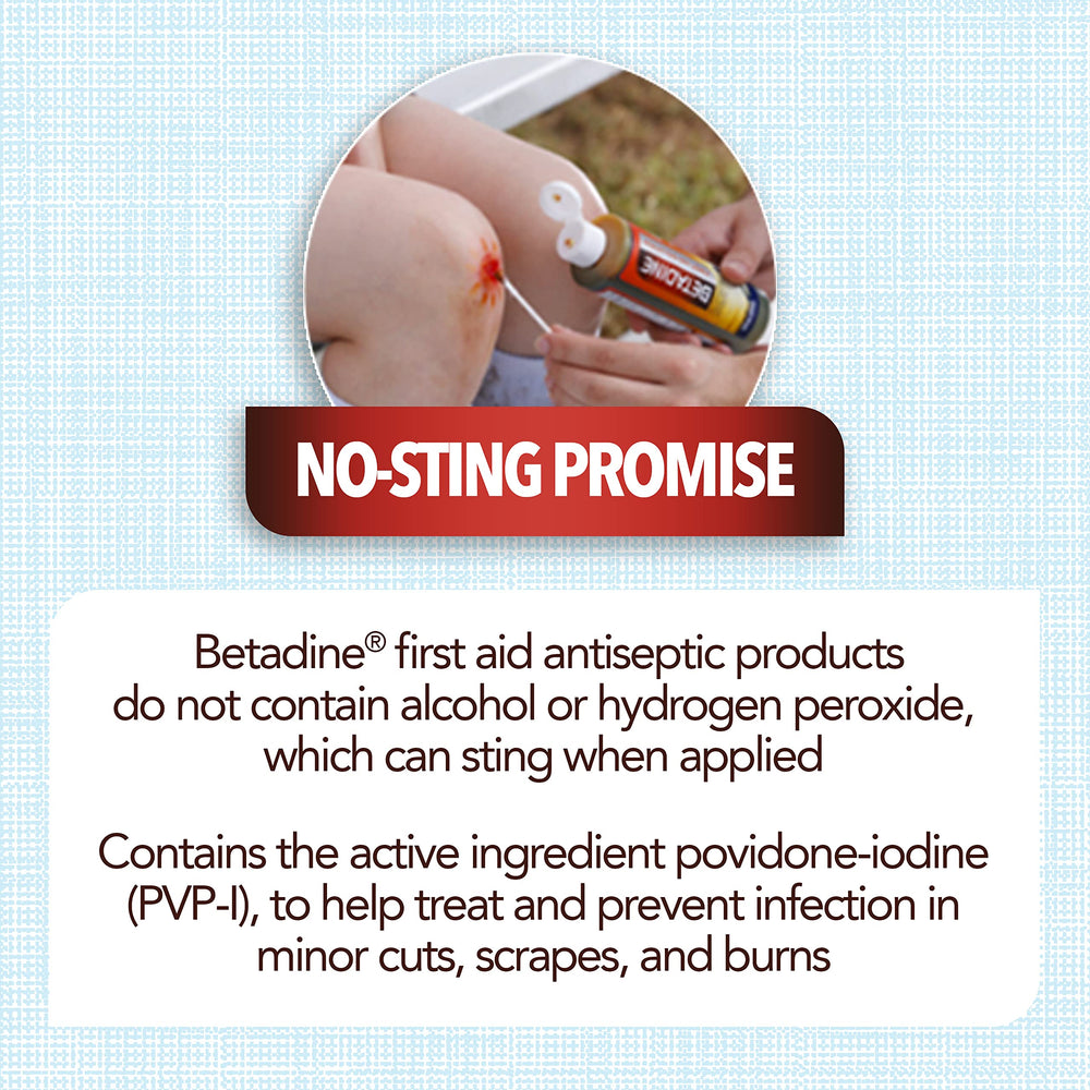 Betadine bottle held in hand for size comparison and portability – convenient for kits