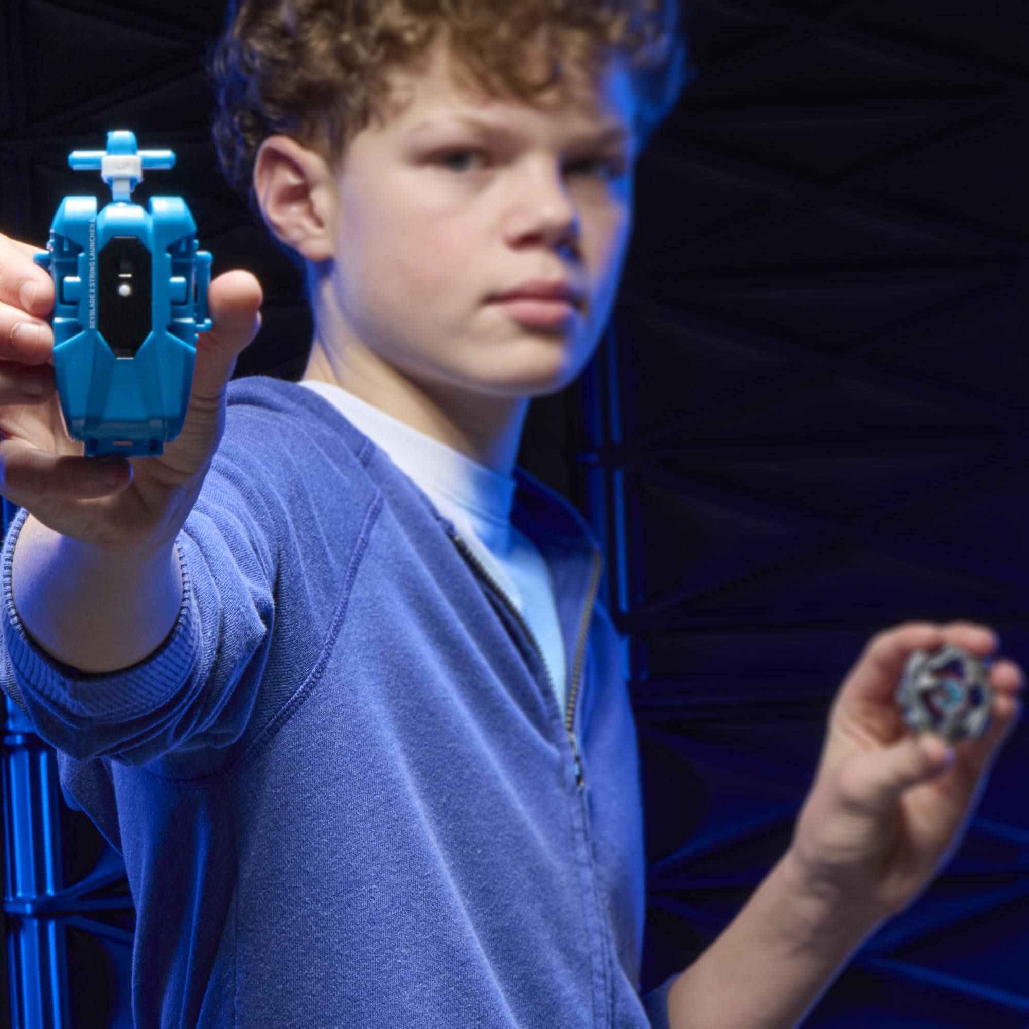 Beyblade Cobalt Dragoon colliding in battle capturing high-impact bursts