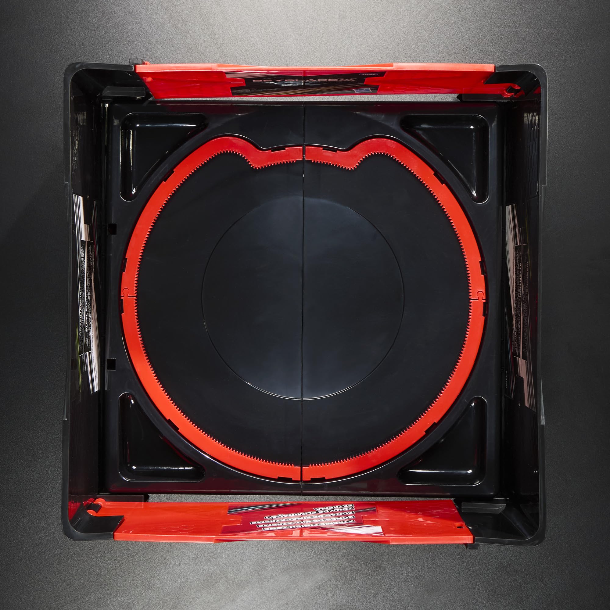 Beyblade top gear engaging stadium rail for Xtreme Dash