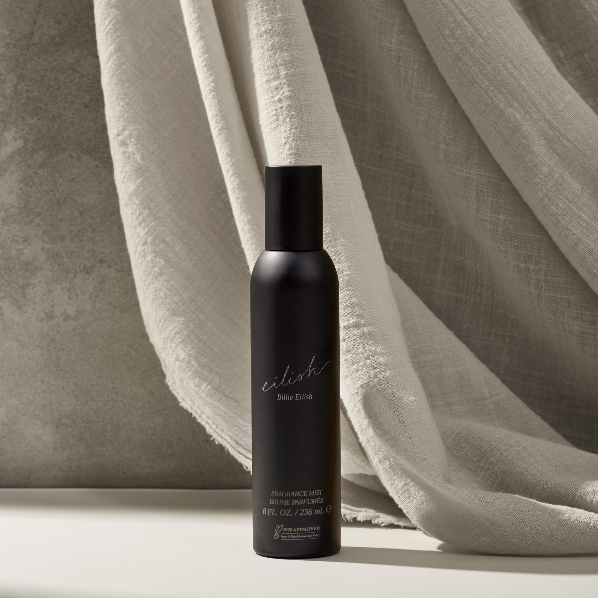 Billie Eilish mist being sprayed on wrist showing quick refresh benefit