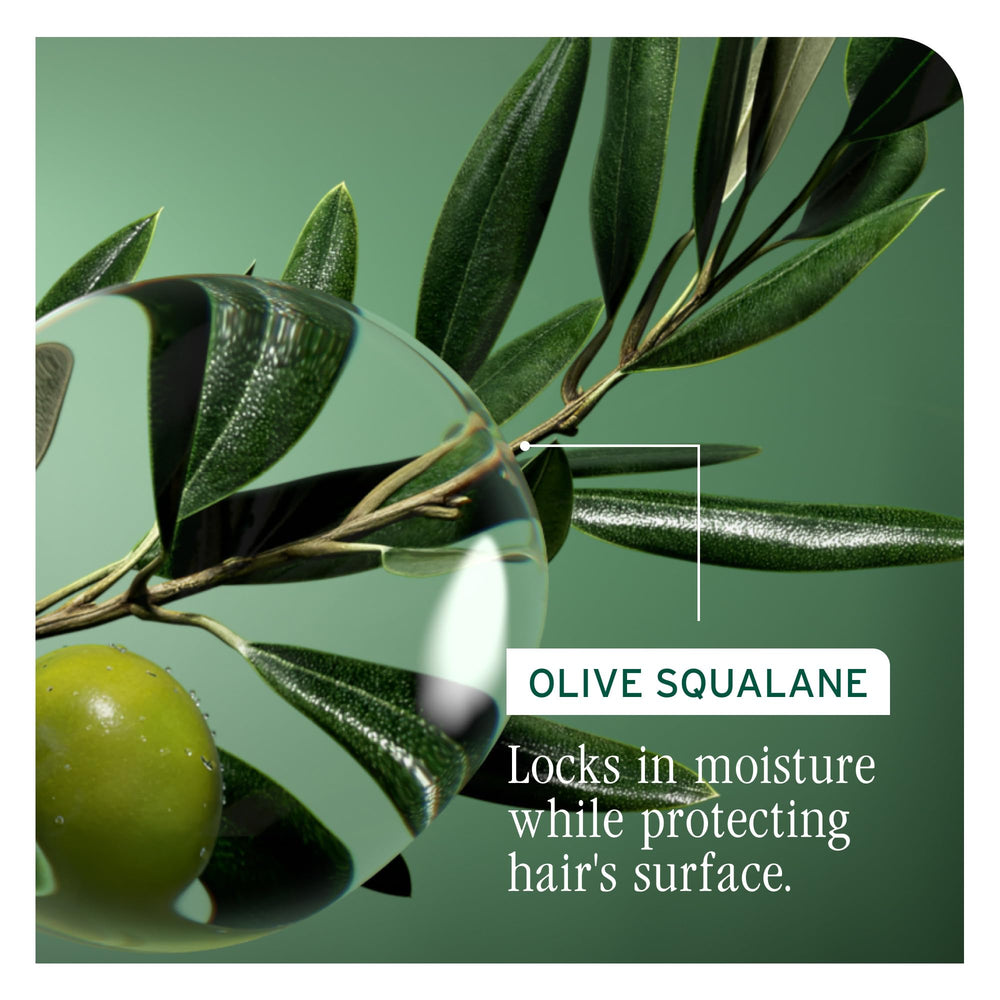 Biolage shampoo being applied in shower demonstrating detangling benefit