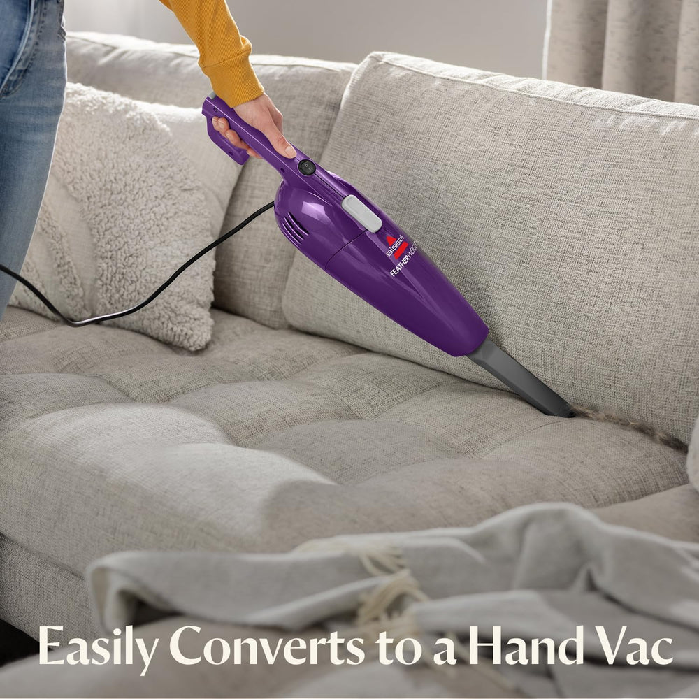 Bissell FeatherWeight in hand-vac mode cleaning sofa cushions for quick pet hair pickup
