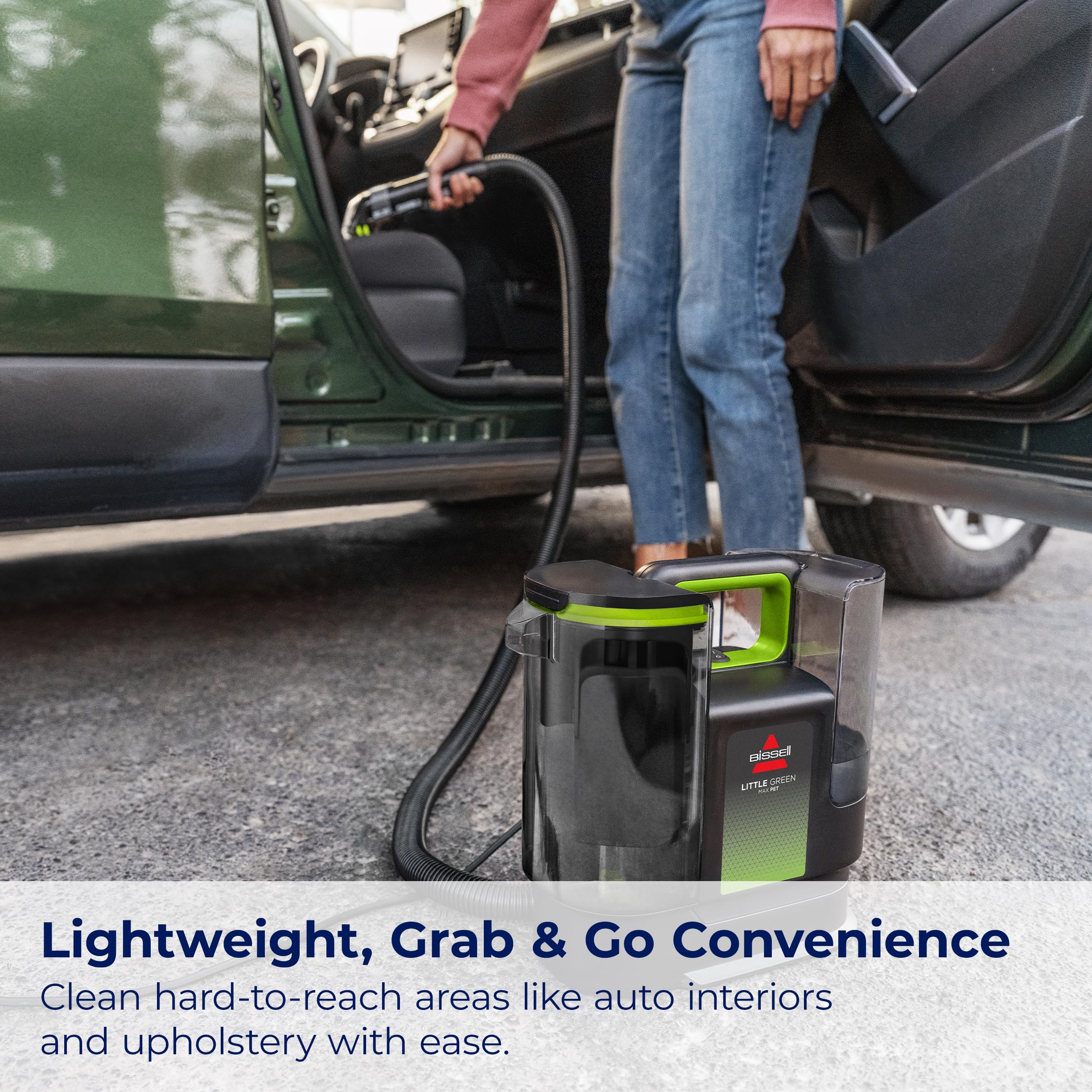 BISSELL Little Green Max Pet hose and cleanout action illustrating one-touch rinse benefit