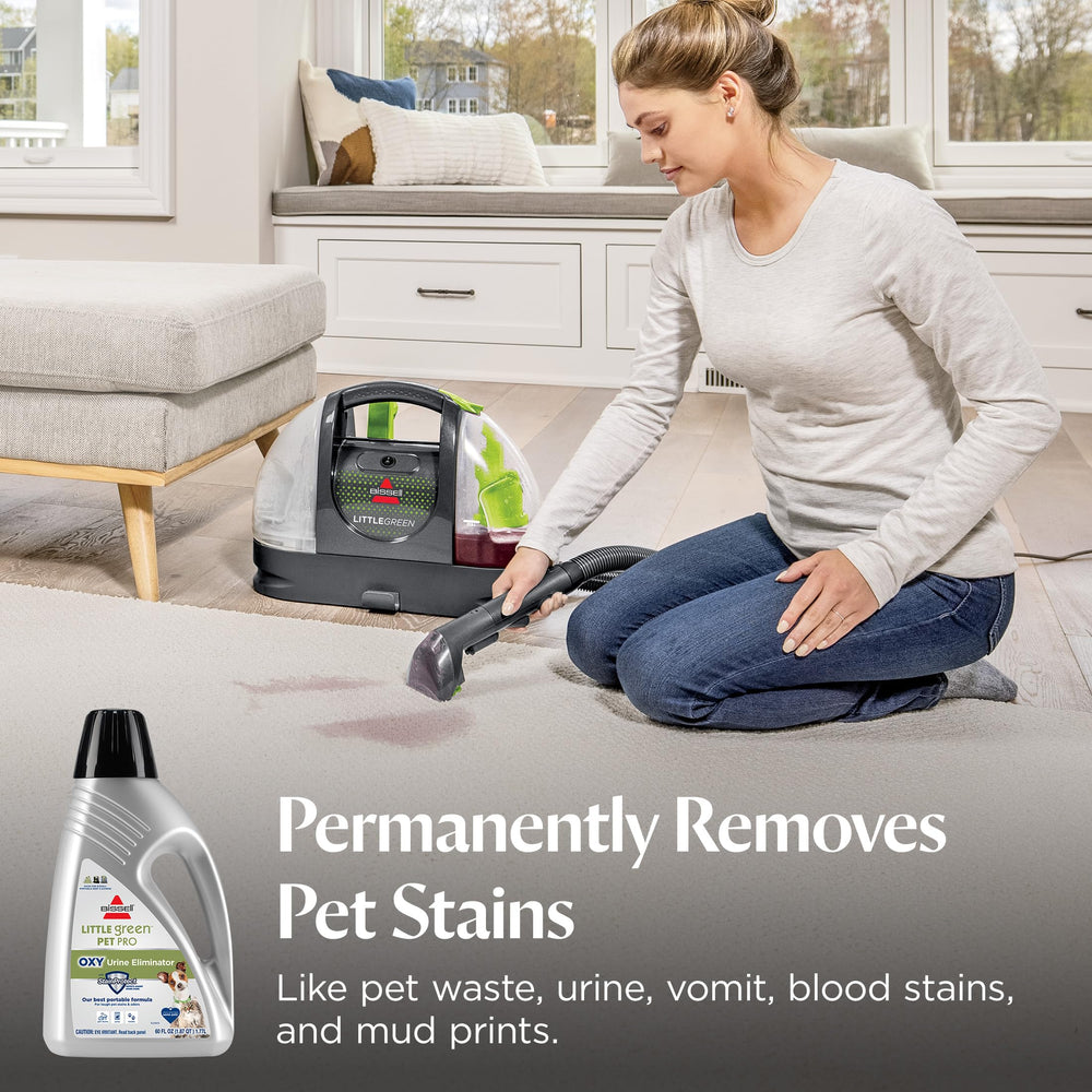 Bissell cleaner removing pet stain on carpet demonstrating effective removal