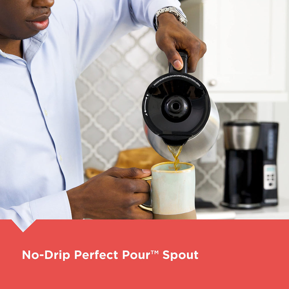 BLACK+DECKER coffee maker next to cups to demonstrate 12-cup capacity and scale