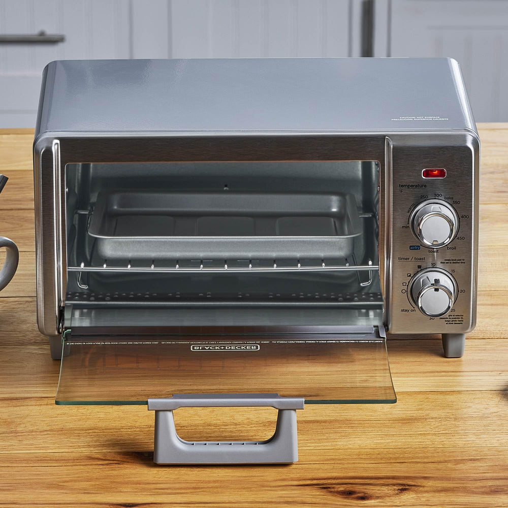 BLACK+DECKER oven placed on a small kitchen counter for space-saving benefit