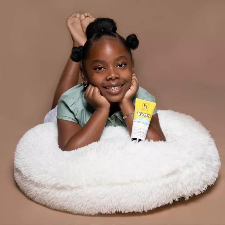 Black Girl Sunscreen kids applied to child face illustrating clear, non-greasy finish