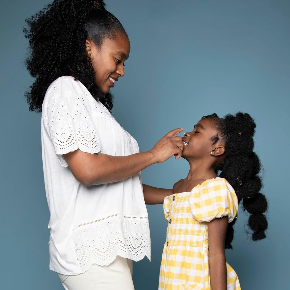 Black Girl Sunscreen kids at family picnic conveying daily outdoor protection
