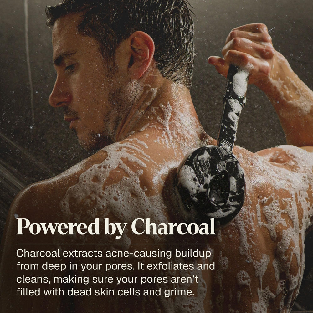 Black Wolf in-shower use showing back application for treating body acne