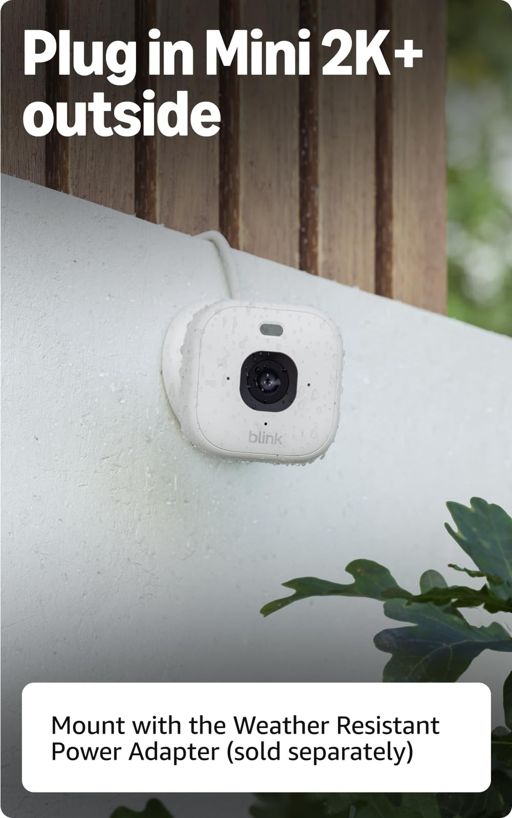 Person speaking into Blink Mini 2K+ to use two-way audio for real-time conversation and check-ins