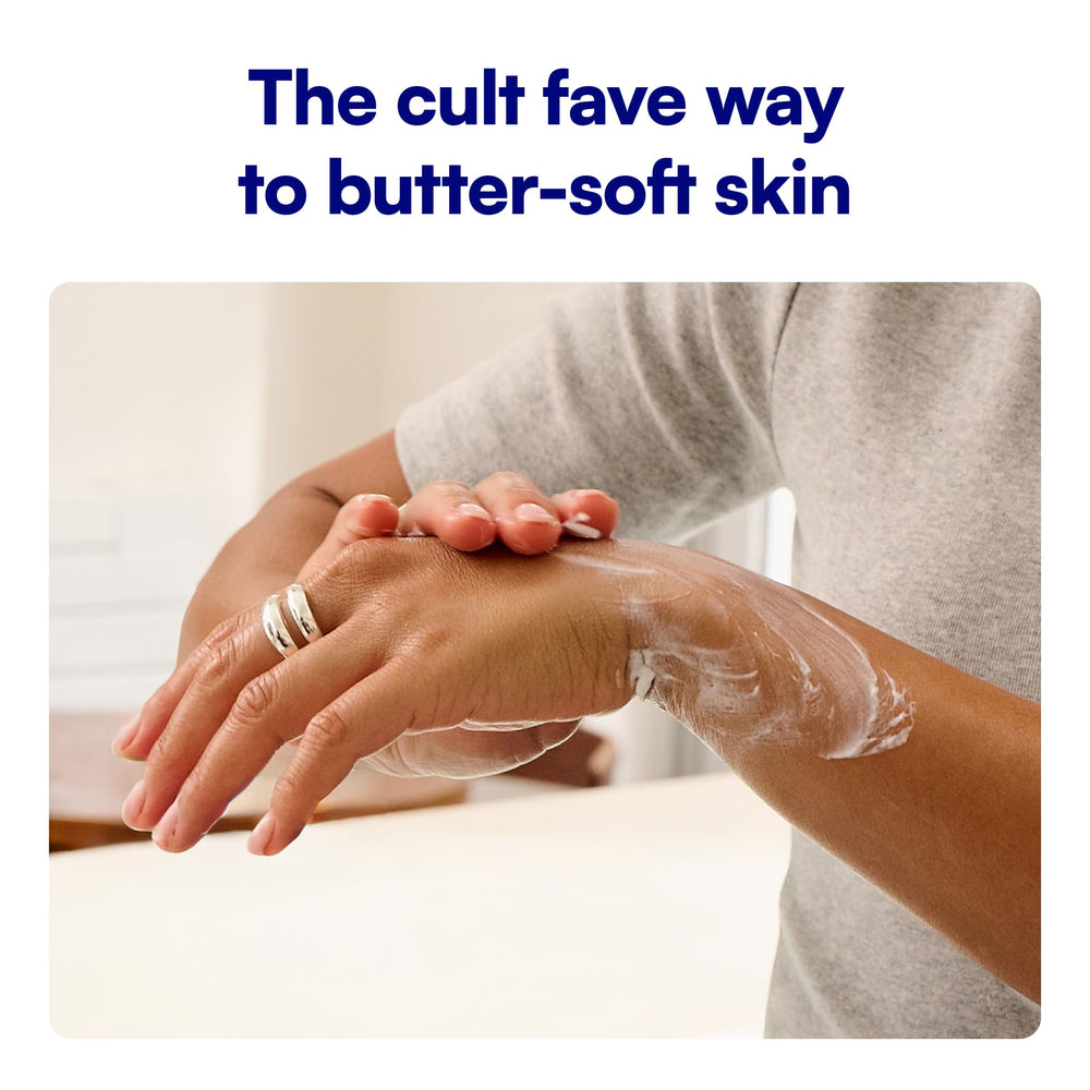 Hand applying Bliss to elbow demonstrating targeted hydration and smoother skin