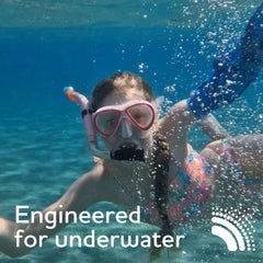 BLOCCS child wearing arm sleeve in pool enabling safe water play