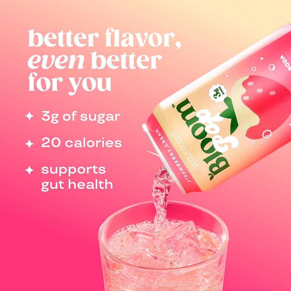 Bloom Nutrition pouring Strawberry Cream soda into a glass, showcasing fizzy texture and appeal