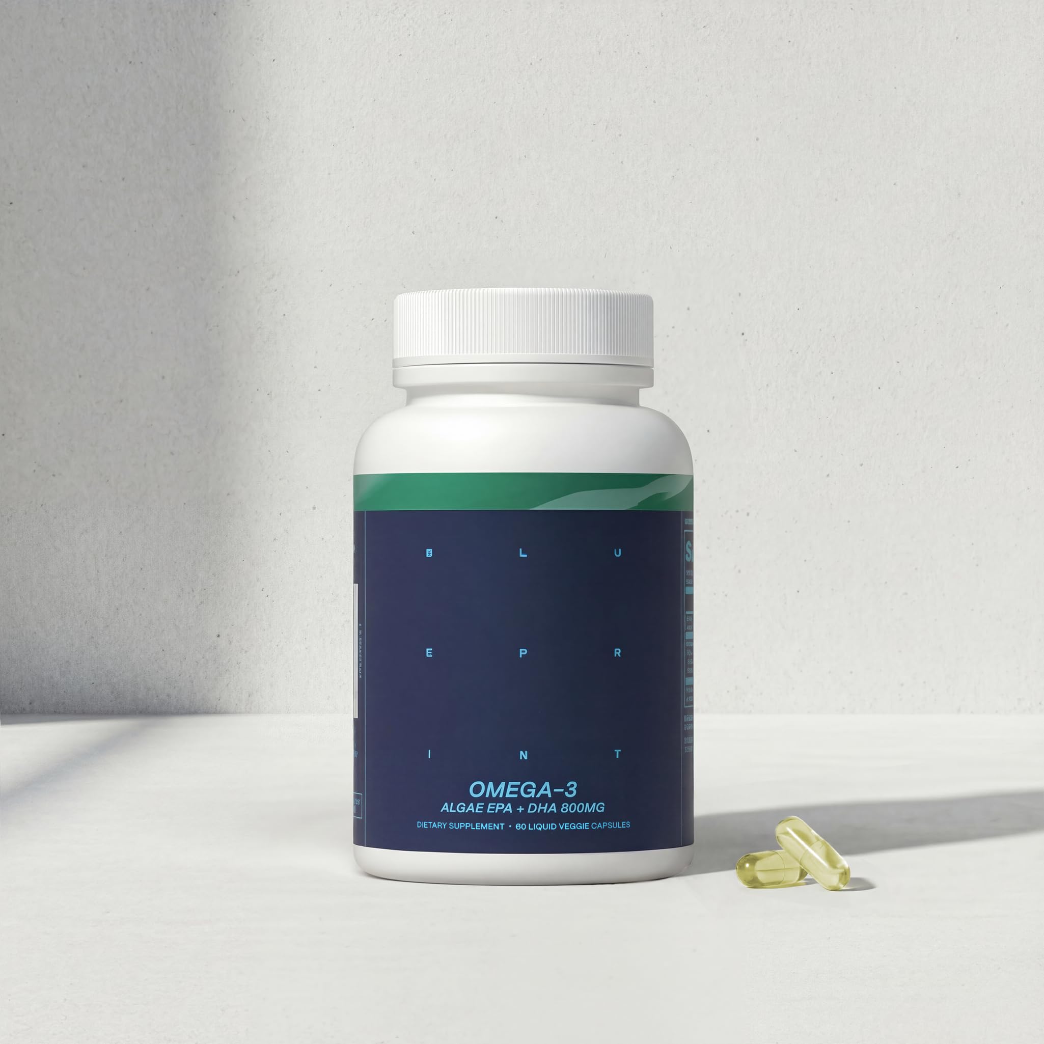 Blueprint Bryan Johnson bottle on a breakfast table showing daily supplement routine and sustainable choice