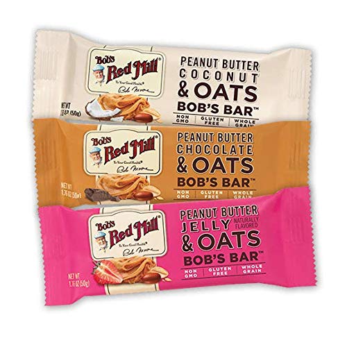 Bob's Red Mill snack bar beside a coffee cup for a quick snack pairing