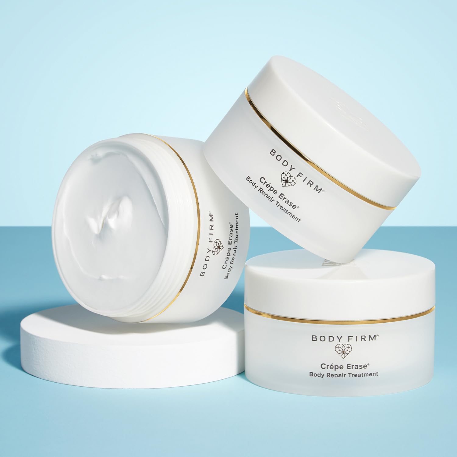 BODY FIRM applied to décolleté highlighting firming benefit and non-greasy finish