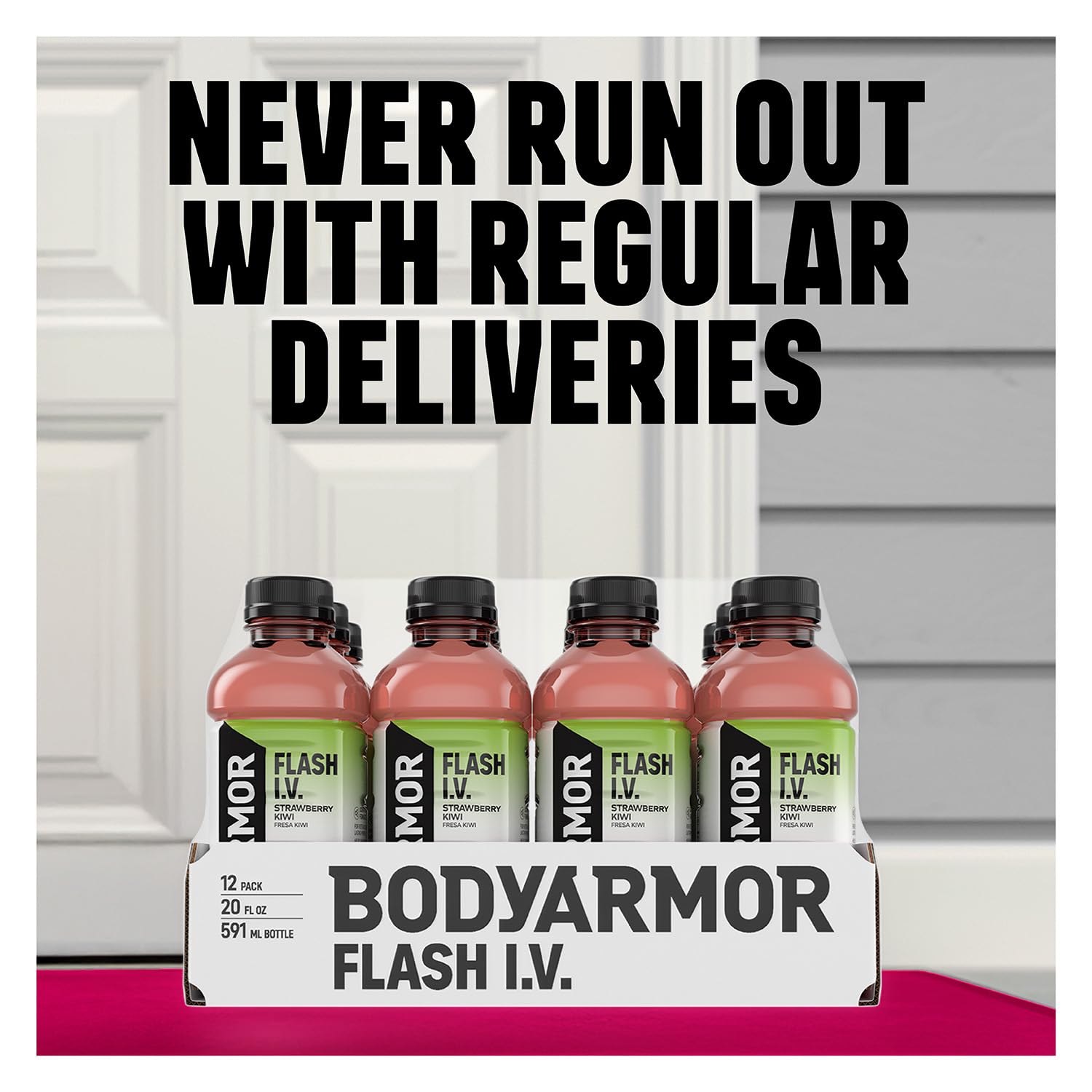 BODYARMOR Flash I.V. grape held in hand showing 20 fl oz scale