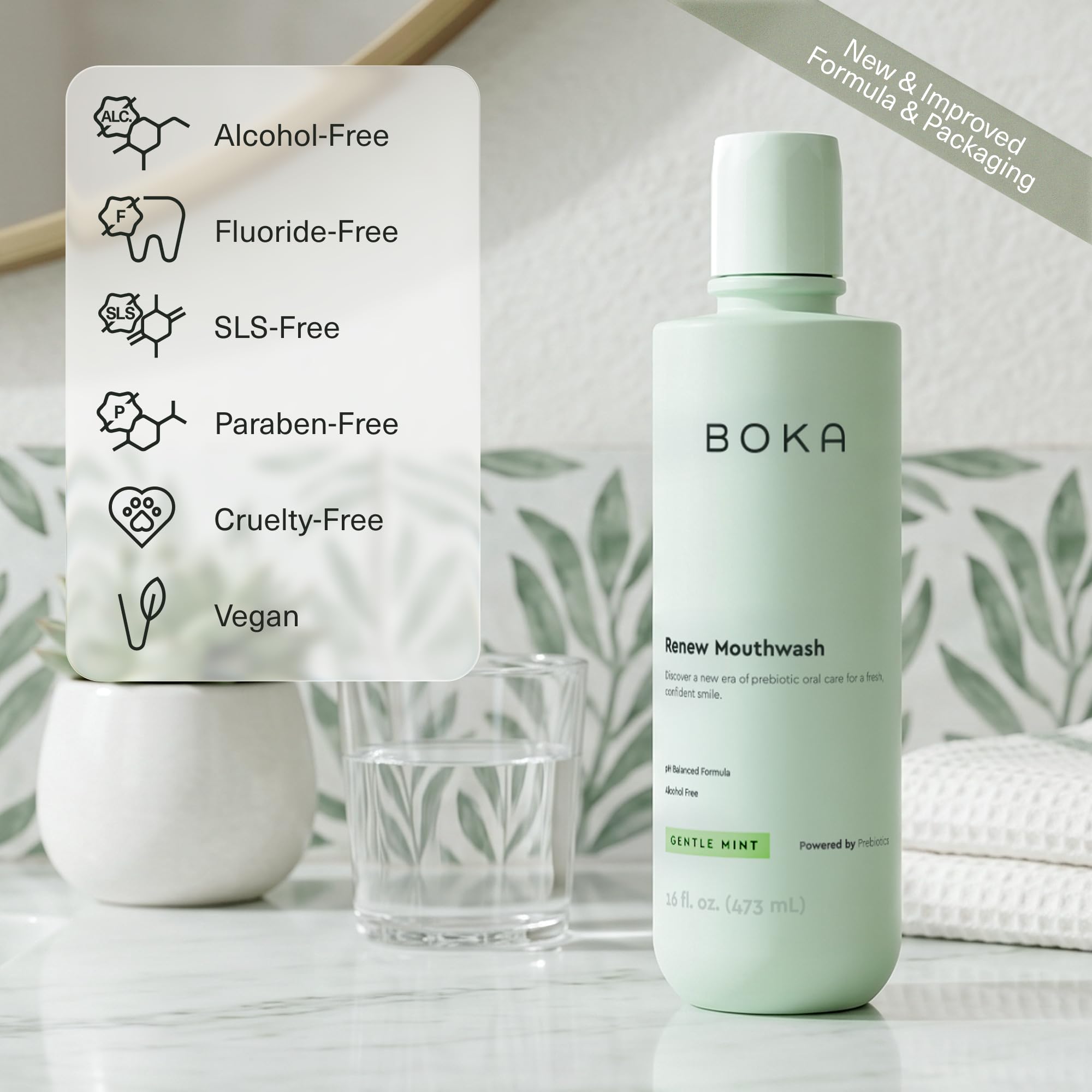 Boka bottle beside toothbrushes to show daily routine use and bathroom compatibility