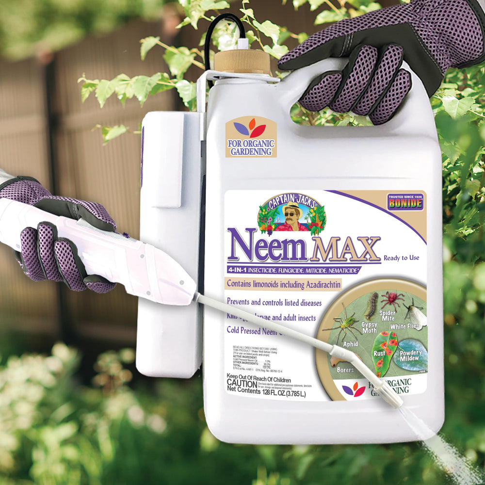 Bonide Neem Max 128 oz bottle held to show scale and easy handling benefit