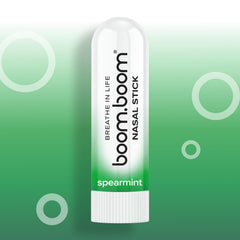 Person using BoomBoom inhaler on a commute to boost alertness and focus