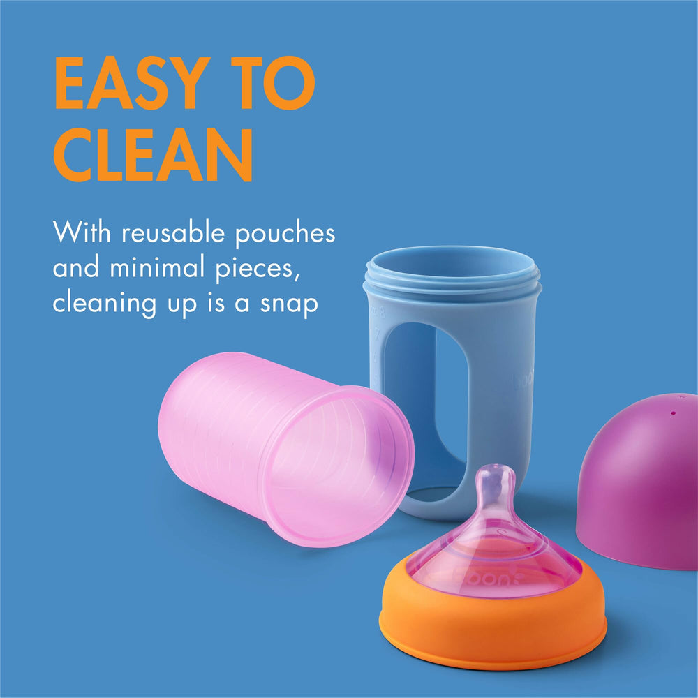 boon lifestyle shot in diaper bag highlighting portable, dishwasher-safe option