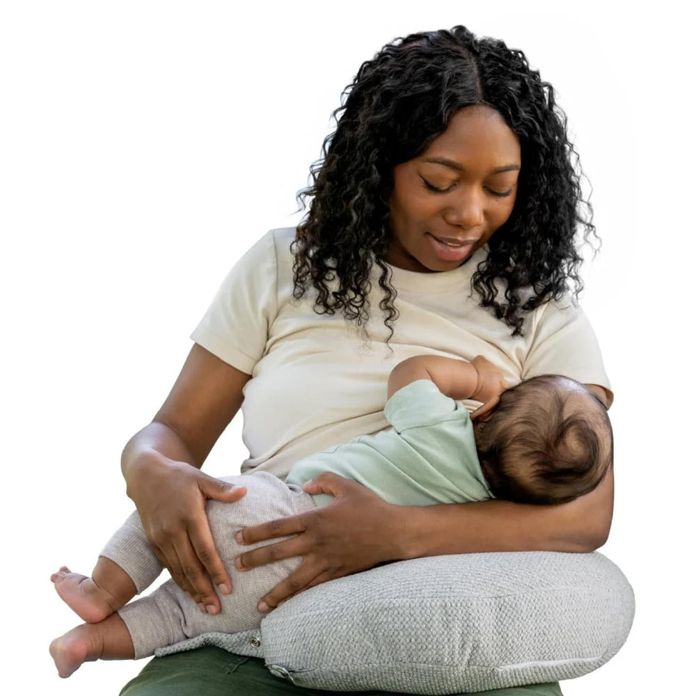 Boppy Anywhere front view showing compact crescent support and comfortable lift