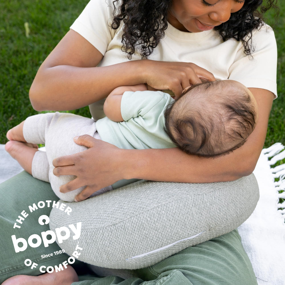 Boppy Anywhere in outdoor lifestyle setting showing comfortable feeding on the go