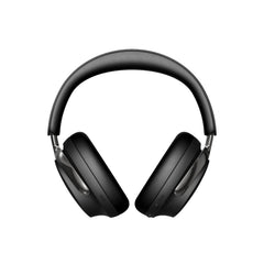Bose QuietComfort Ultra worn on airplane demonstrating noise cancellation for travel focus