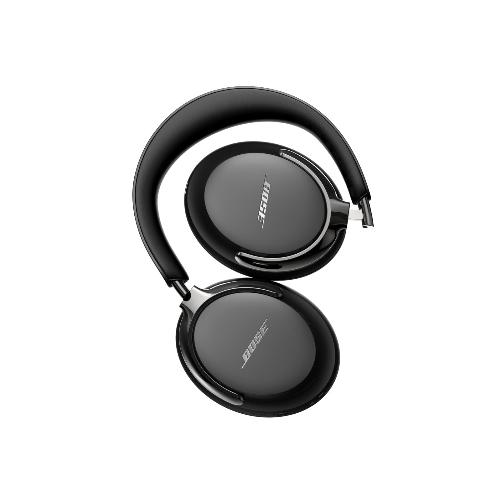 Bose QuietComfort Ultra on desk with laptop demonstrating clear calls and immersive audio