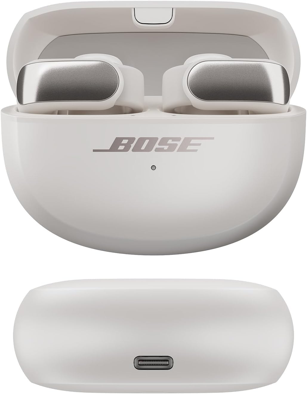 Hand holding Bose Ultra Open Earbuds to show compact size and portability