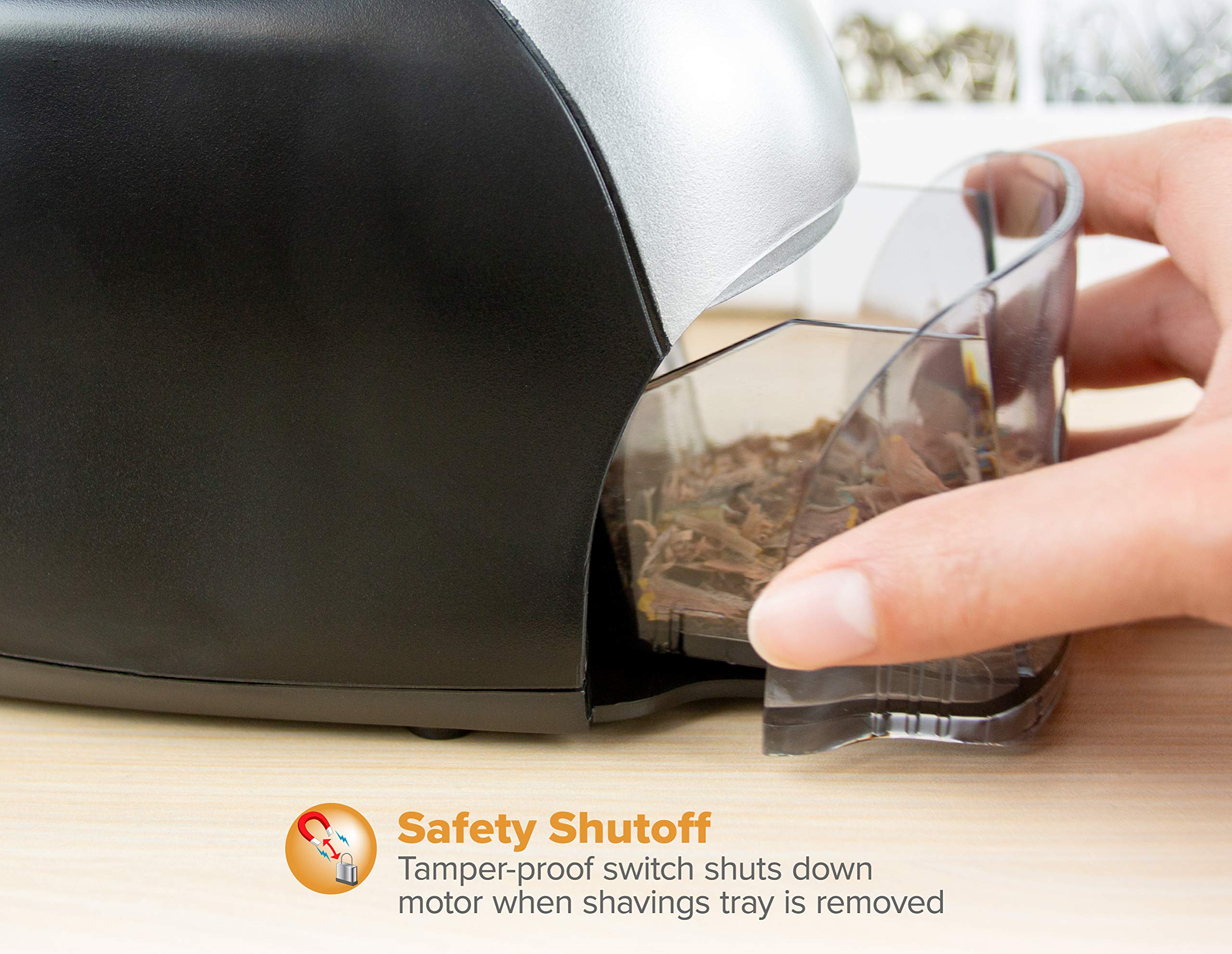 Bostitch QuietSharp shavings receptacle removed, showing easy-clean feature and safety switch