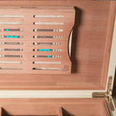 Boveda Size 60 placed inside a humidor demonstrating steady 69% RH protection