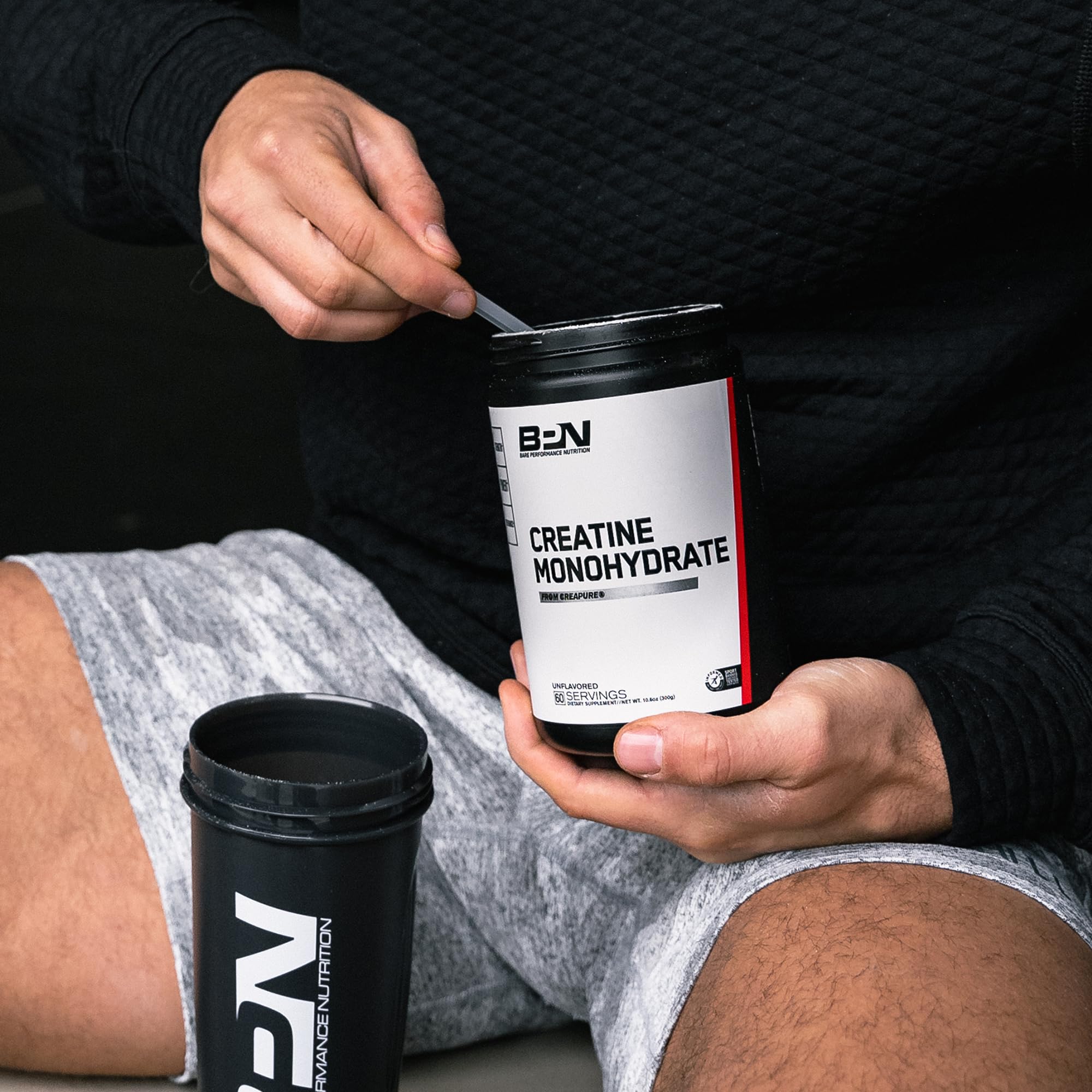 BARE PERFORMANCE NUTRITION label close-up showing Creapure and third-party testing assurance