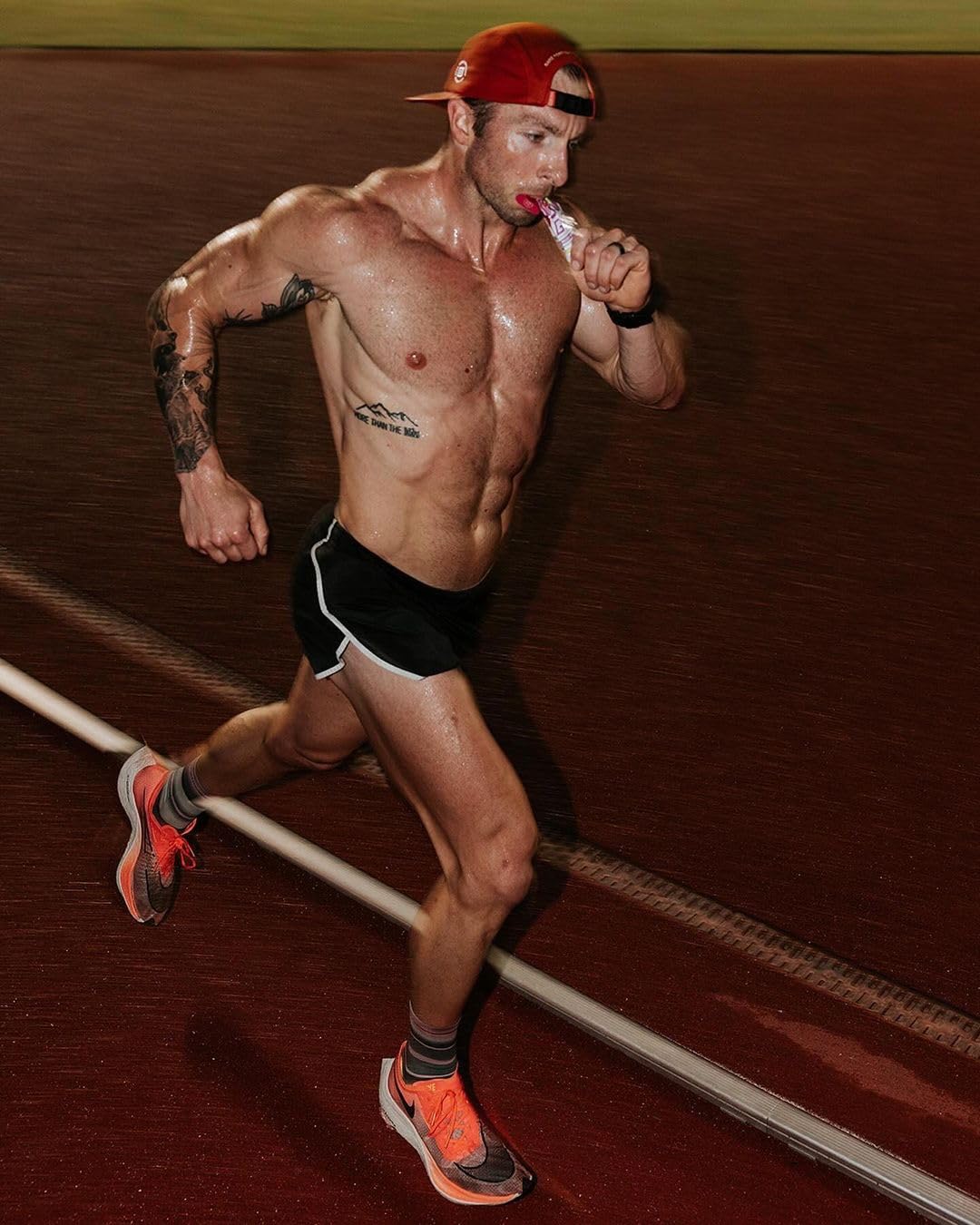 BARE PERFORMANCE NUTRITION gel used by runner showing on-the-go fueling