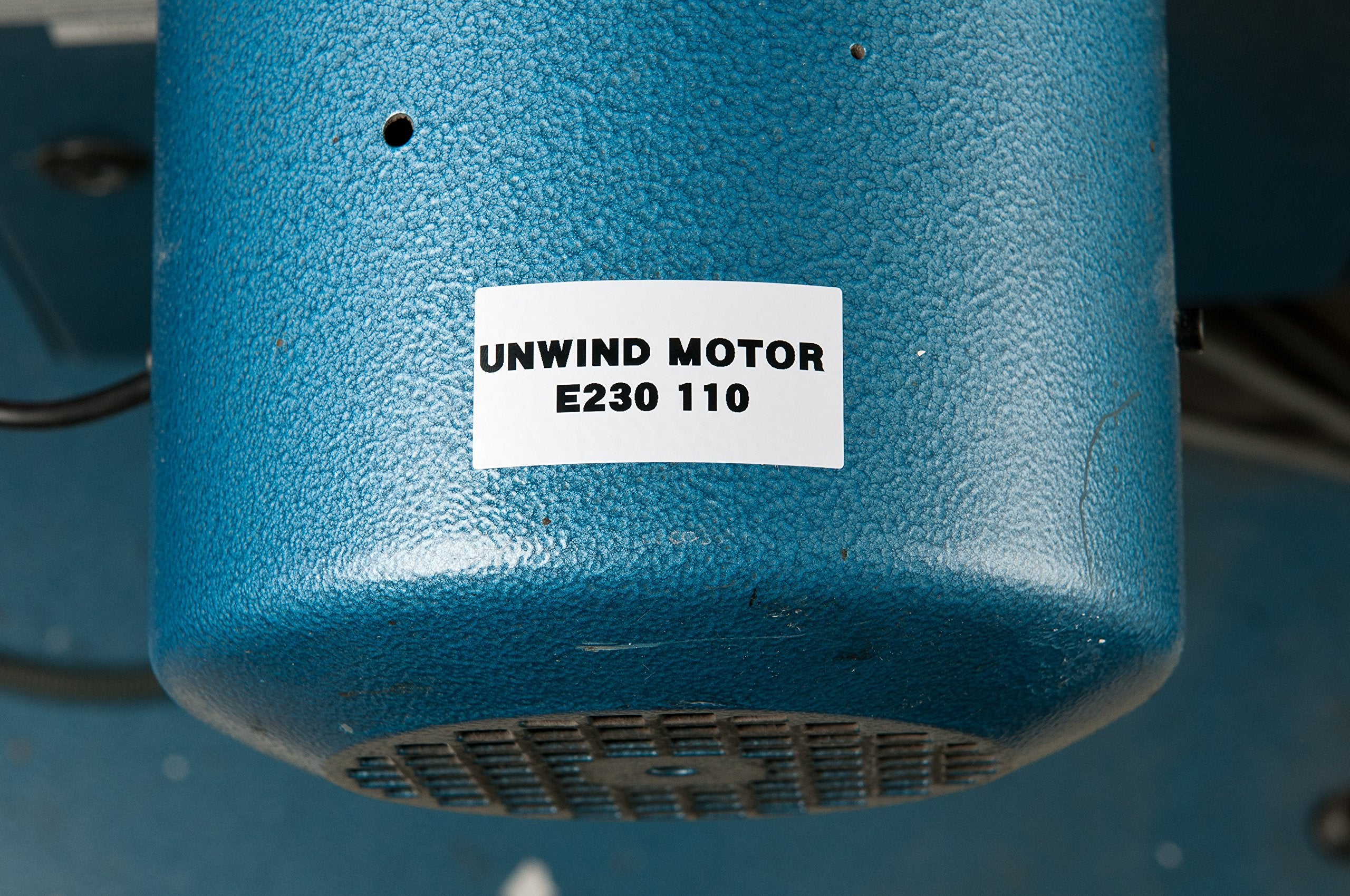 Brady roll beside a ruler showing .75 inch width and compact length