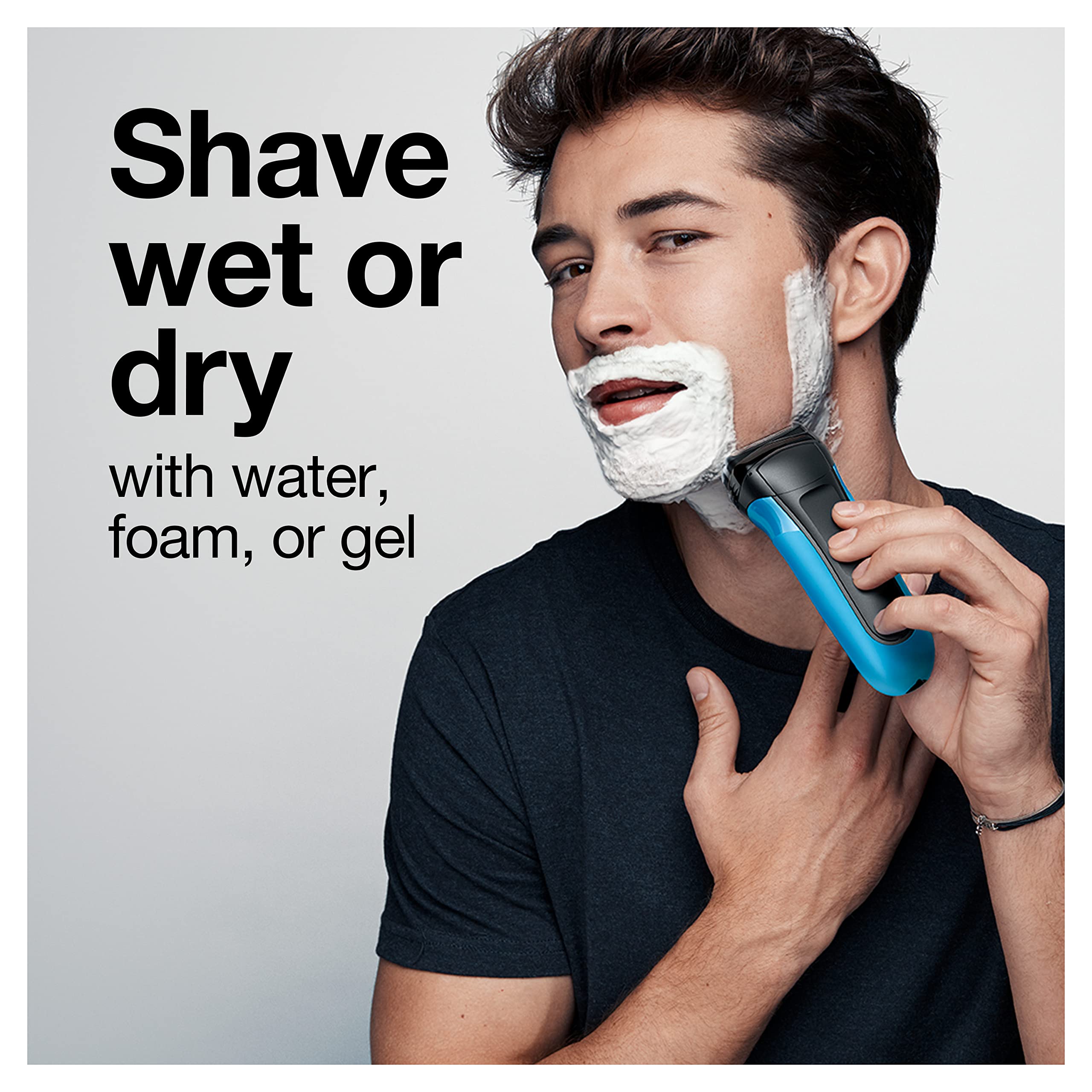Braun Series 3 held in hand to show scale and comfortable grip for steady control