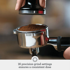 Breville steam wand texturing milk to smooth microfoam for latte art