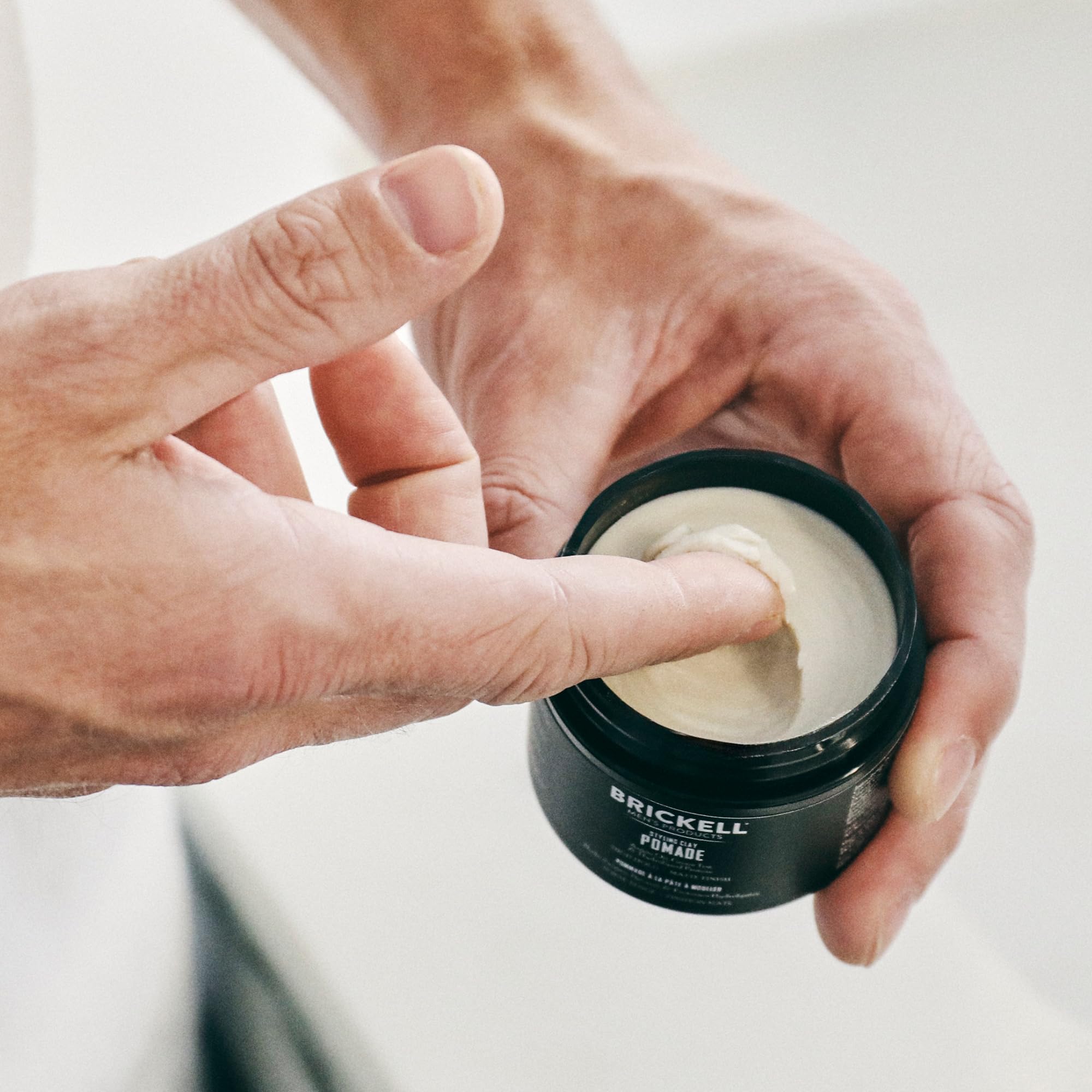Man styled with Brickell pomade showing natural matte finish benefit