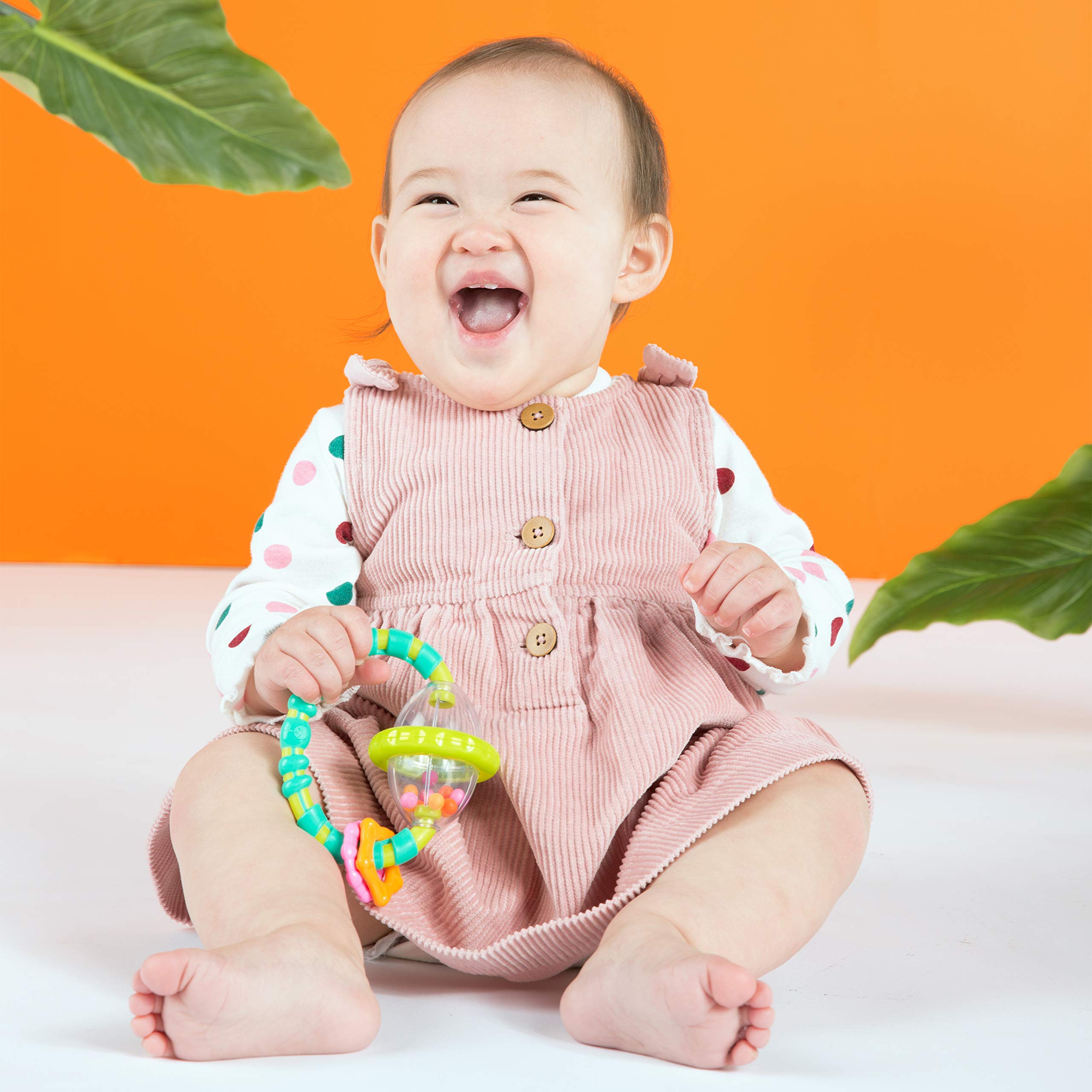 Bright Starts License to Drool key-ring teether shown in hand for soothing teething