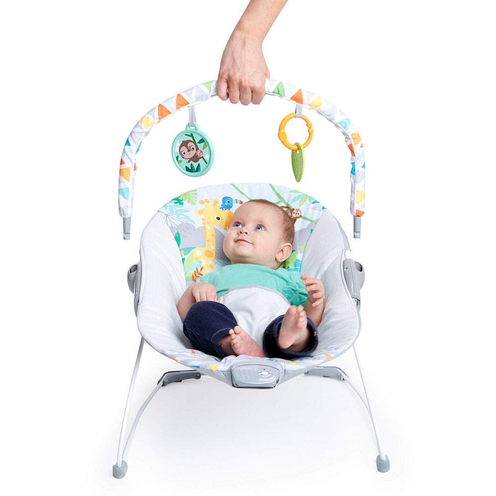 Bright Starts baby in bouncer lifestyle scene showing vibration use and parent supervision benefit