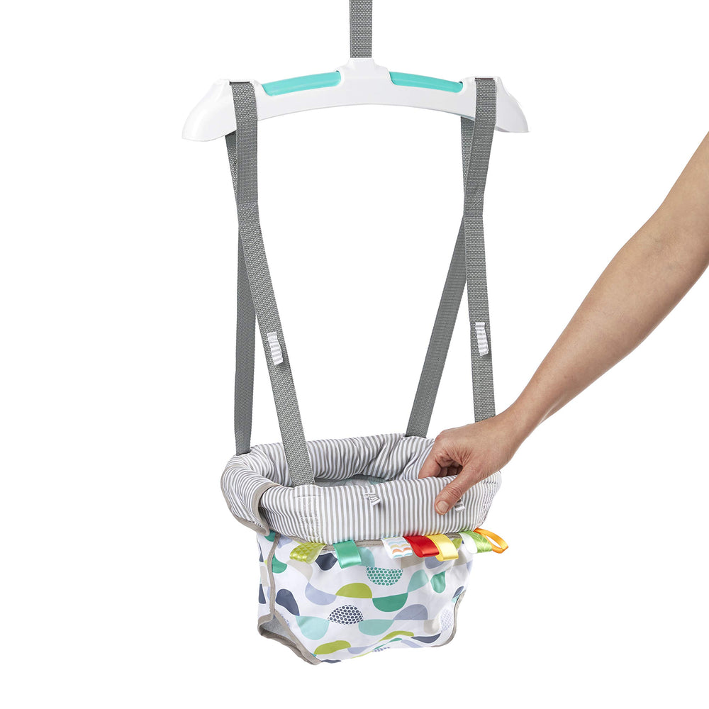 Bright Starts size comparison next to chair showing compact footprint and storage benefit