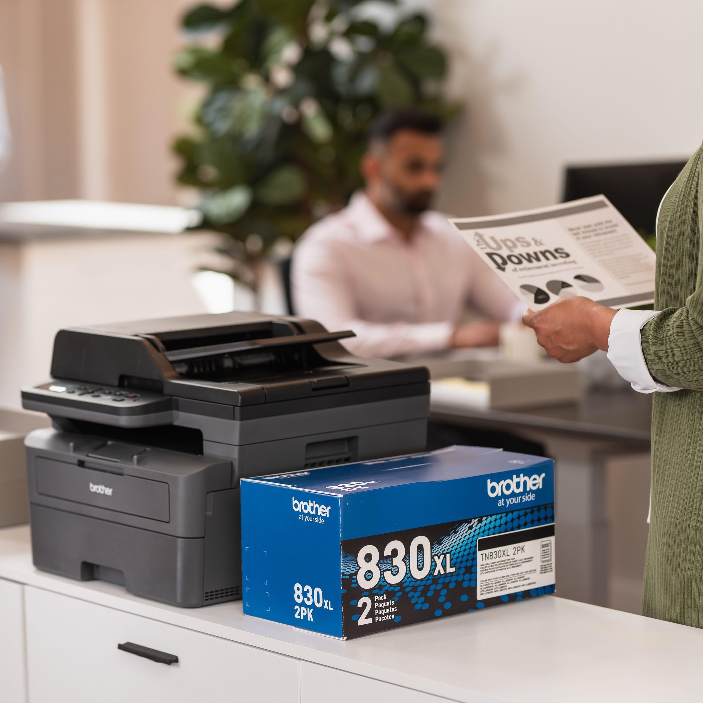 Brother DCP-L2640DW on an office desk in use printing and scanning for team workflows