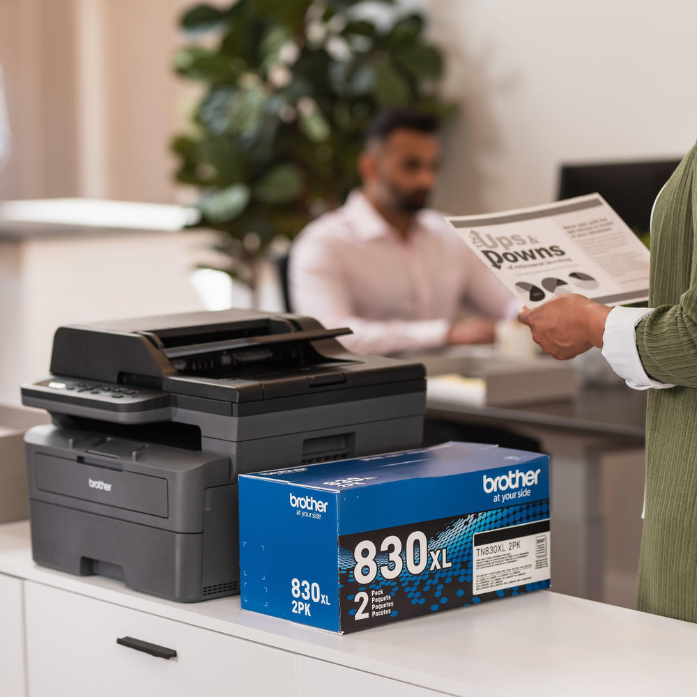 Brother DCP-L2640DW on an office desk in use printing and scanning for team workflows